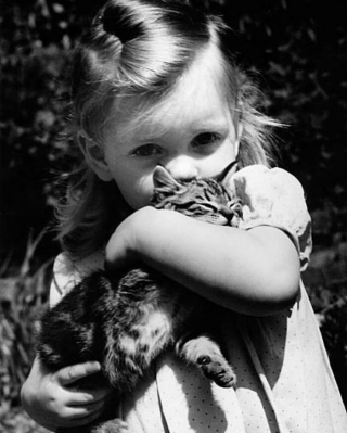 Illustration de l'article : 18 photos illustrant le lien unique entre les chats et les enfants