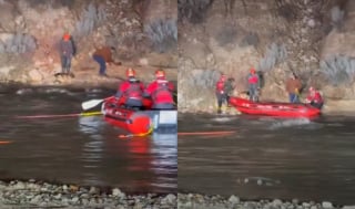 Illustration de l'article : 2 hommes traversent des eaux d&eacute;cha&icirc;n&eacute;es pour secourir un Berger Allemand coinc&eacute; sur une pente et se retrouvent pi&eacute;g&eacute;s pendant des heures