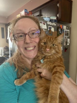 Illustration de l'article : 10 photos de chats roux assortis à leur adoptant