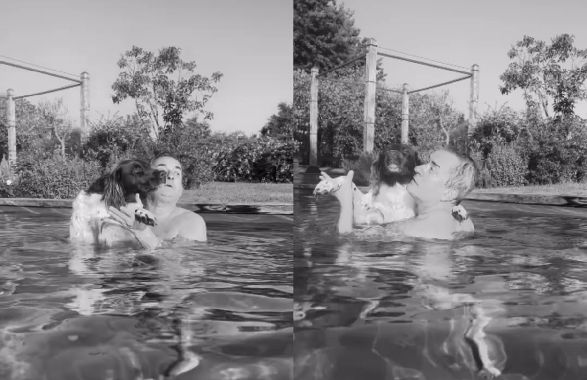 Christophe Dechavanne dansant avec Lazare dans la piscine